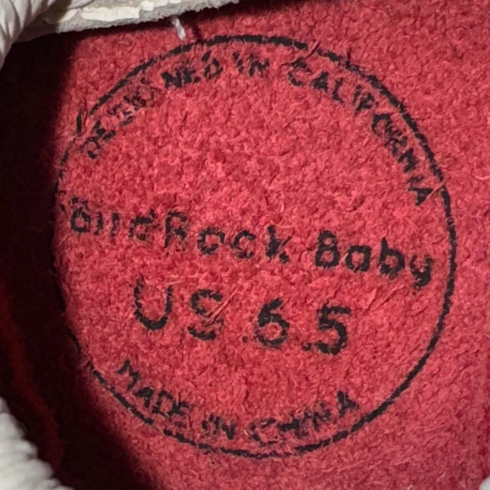 BirdRock Baby Home Run genuine leather baby moccasins with a baseball design.